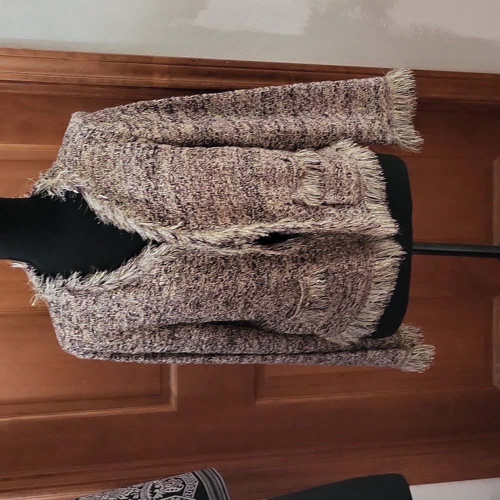 Gold ,brow jacket with gold thread thru out the jacket with fringe. Has pockets.